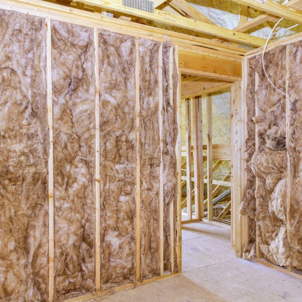 During home construction with is installed under roof thermal foam insulation ceiling of new frame house