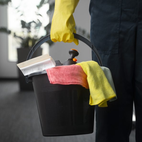 front-view-man-cleaning-indoors