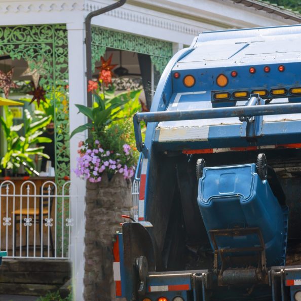 Urban municipal recycling garbage collector truck waste trash bin in industrial vehicle